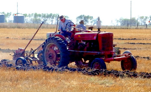 Gas Tractor Plowing
